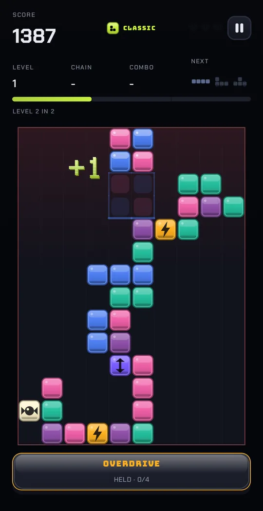 A game of KAMIKAZ in play: the board filling up, a bomb and an ice block waiting, the detonator along the bottom.